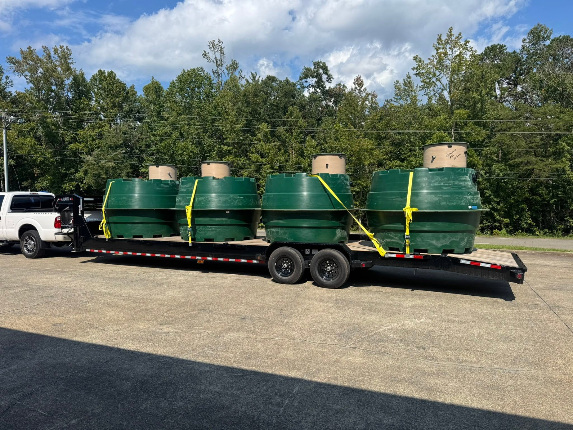 Orenco treatment systems loaded on an EMS trailer for delivery.
